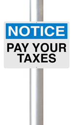 Sign with Pay Your Taxes on it
