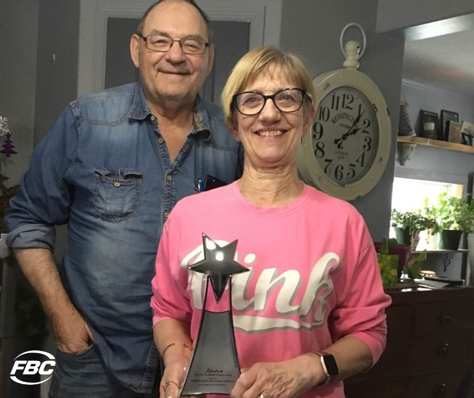 Maggie Gervais poses with the Stars of Alberta Volunteer Award